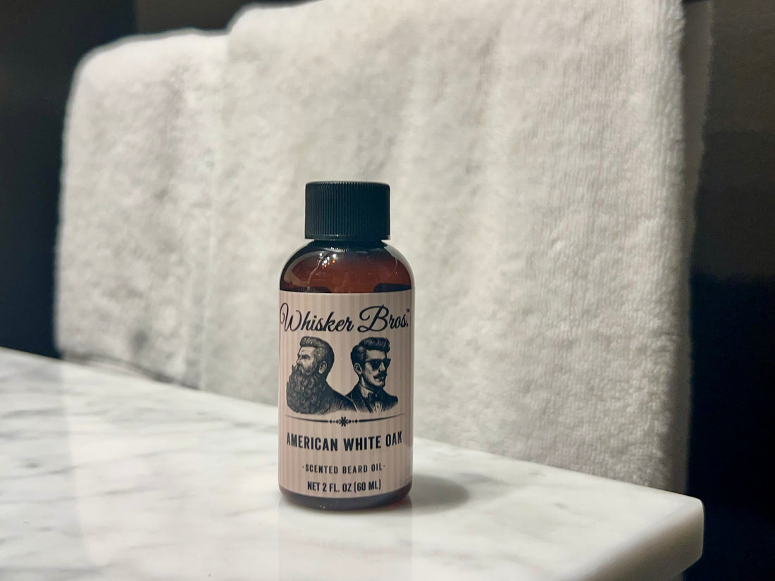 Bottle of Whisker Boss American White Bear on a marble surface with a towel in the background